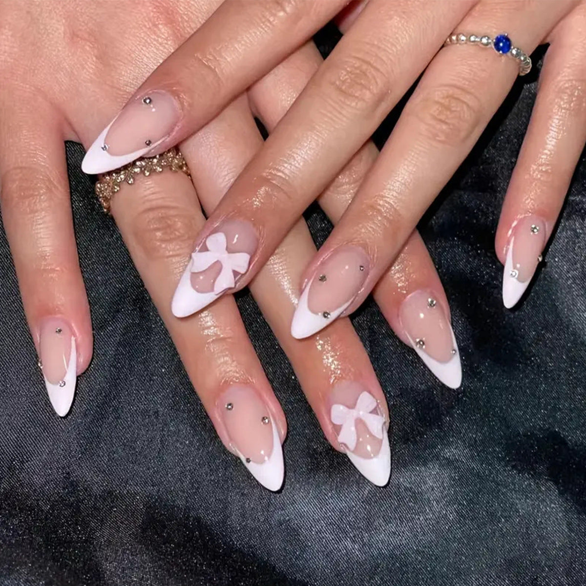 Chic Elegance Medium Almond White and Clear Nails with Floral Accent and Glittering Rhinestones