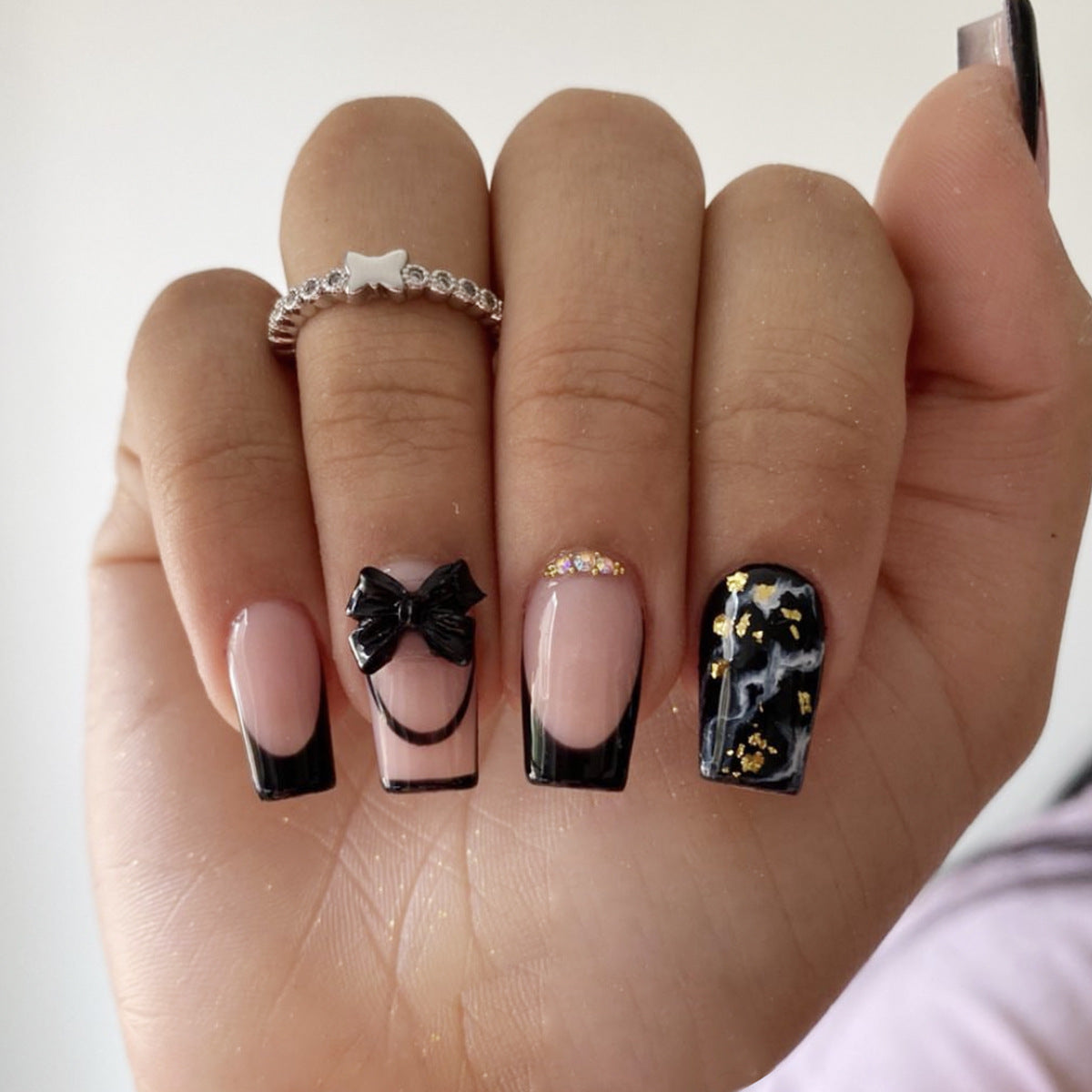 Chic Bowtastic Medium Square Black and Beige Press On Nail Set with Sparkling Accents and Glitter Detail