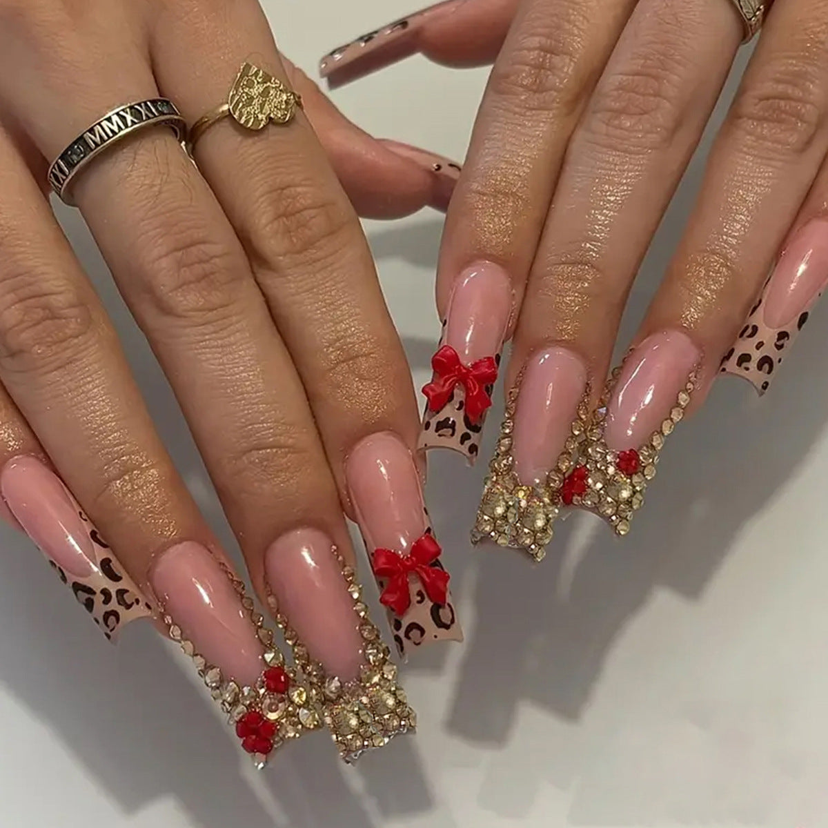 Chic Leopard Luxury Long Square Pink Glamour Press-On Nail Set with Stunning Gemstones and Bows