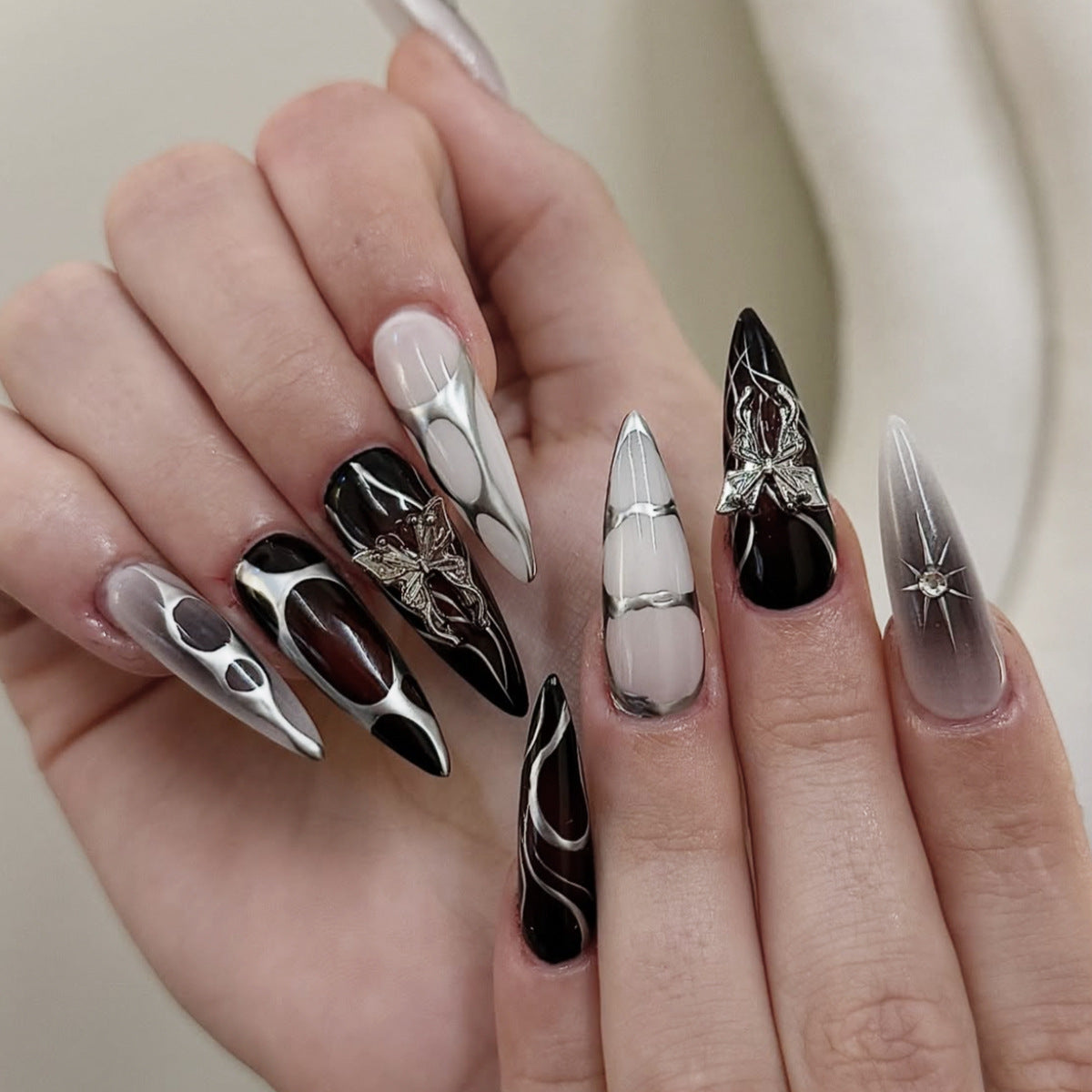 Gothic Elegance Extra Long Stiletto Black and White Nail Set with Stunning Metallic Accents