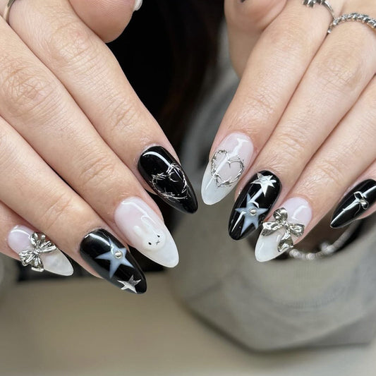 Mystical Elegance Medium Almond Black and White Press On Nail Set with Unique Charms and Designs