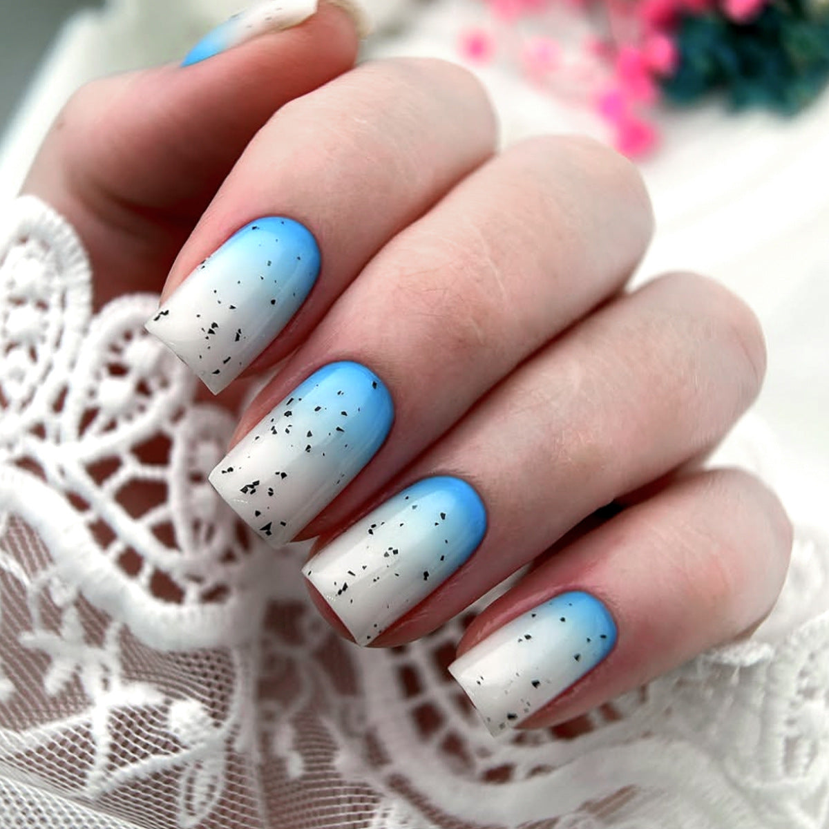 Ocean Breeze Ombre Medium Square Sky Blue and White Nail Set with Unique Textured Black Specks