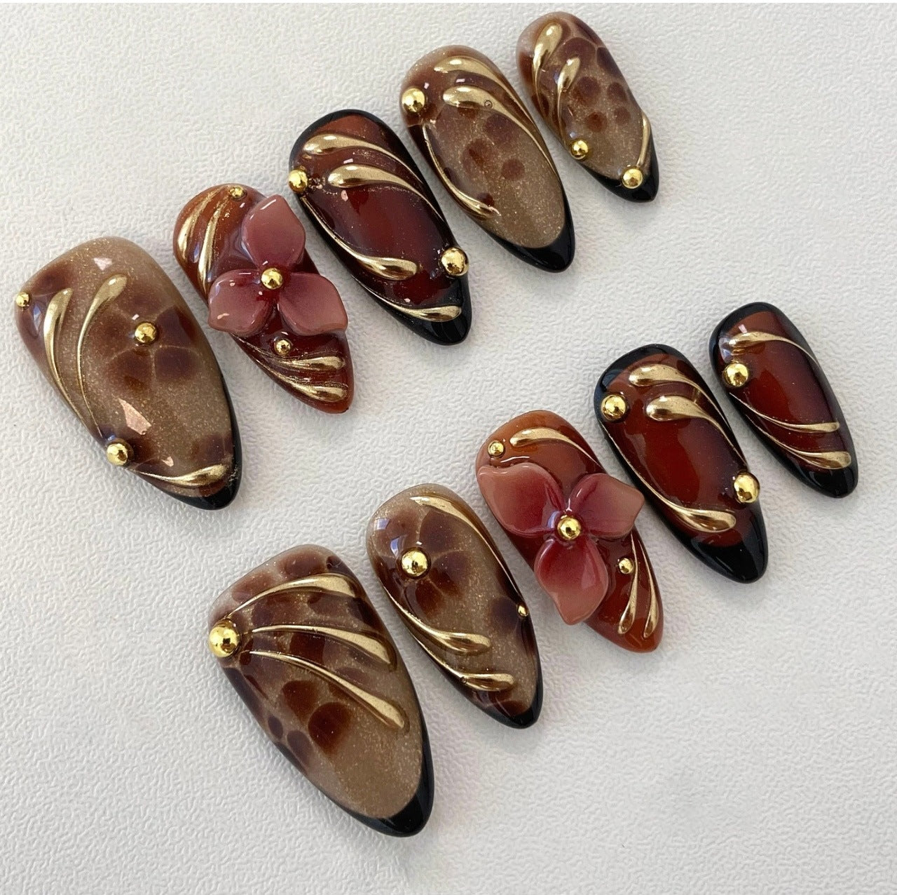 Glamorous Fashion Empress Long Almond Brown with Floral Accents and Gold Detailing Press On Nail Set