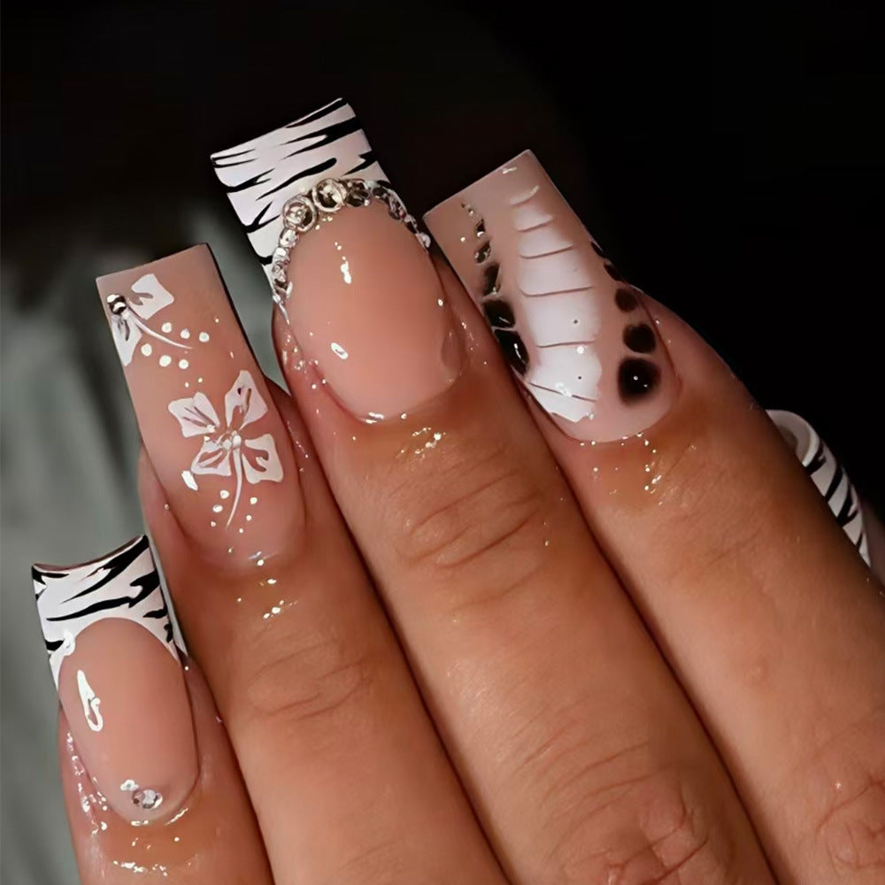 Chic Safari Inspired Long Square Beige Nails with Striking Animal Print and Crystal Accents