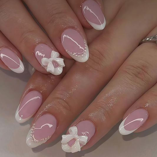 Chic Elegance Short Almond Pink with French Tips and Charming Bow Accents Press On Nail Set