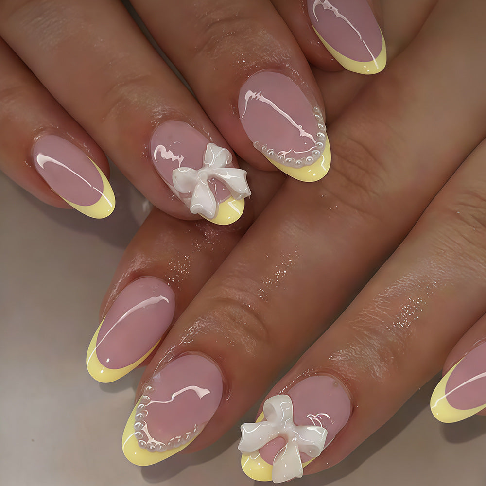 Charming Pastel Dream Short Almond Pink with Yellow Tips and Adorned with Bows and Pearls Press On Nail Set