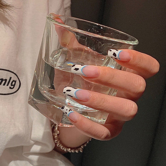 Elegant Paw Print Fantasy Medium Oval White and Black Press On Nail Set with Blue Accent Tips