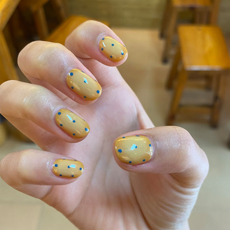 Sunny Delight Short Oval Bright Yellow Nails with Fun Blue Accents