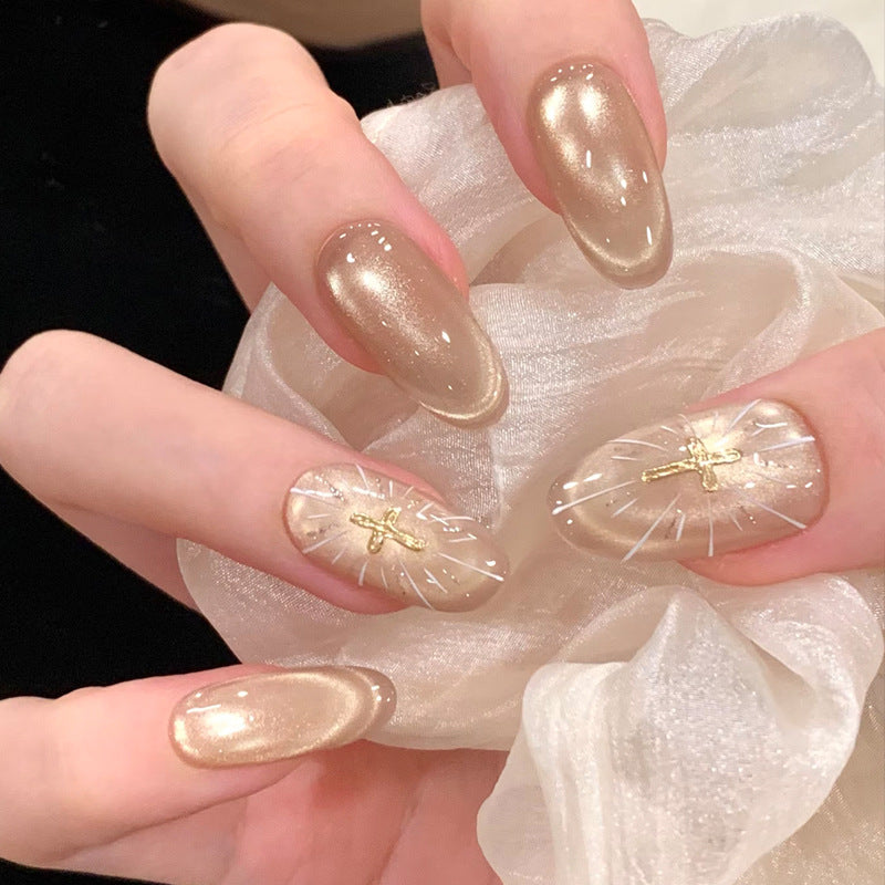 Gilded Elegance Long Oval Shaped Champagne Press On Nail Set with Unique Gold Accent Design