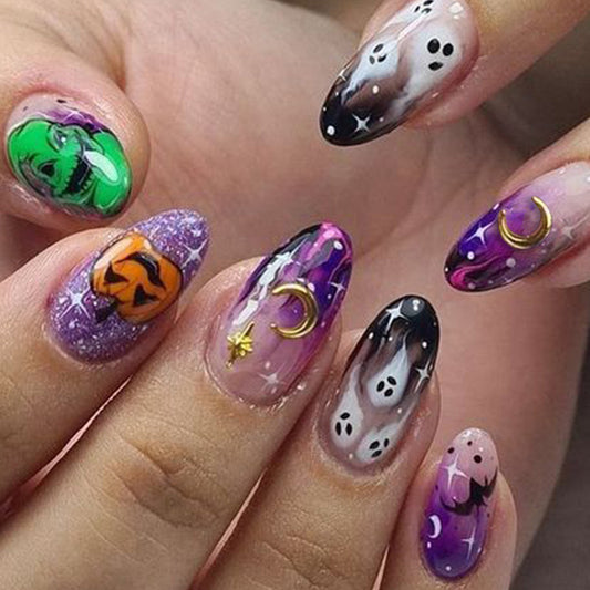 A set of long, almond-shaped, press-on nails featuring a variety of Halloween-themed designs including ghosts, pumpkins, and stars in a colorful arrangement.