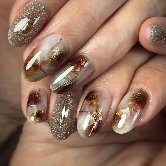 Gilded Elegance Medium Oval Transparent and Glittering with Floral Accents Press On Nail Set