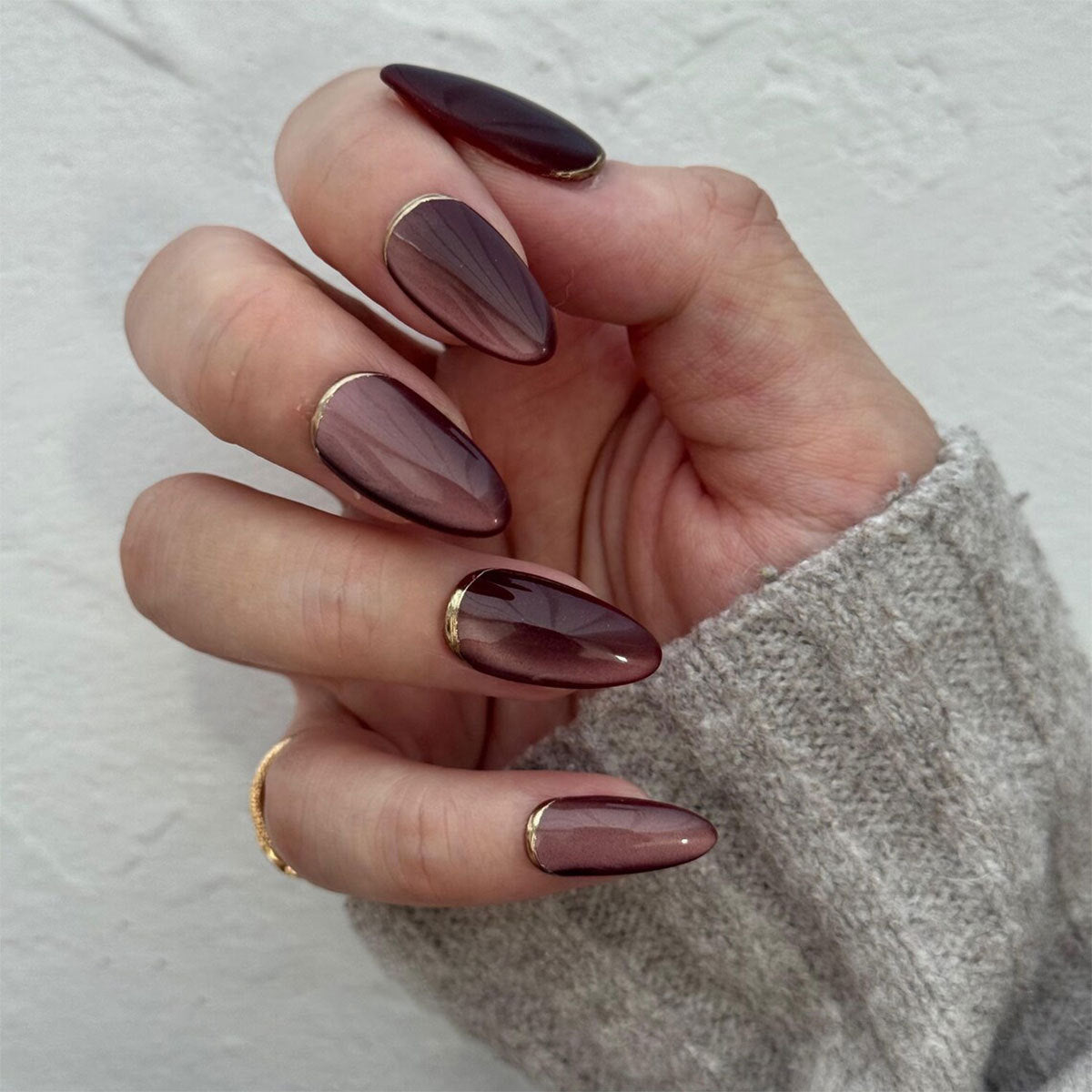 Elegant Charm Long Almond Burgundy Gradient Nails with Gold Tip Accents