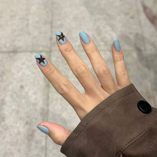 Celestial Dreams Medium Squoval Sky Blue Nails with Unique Star Accent