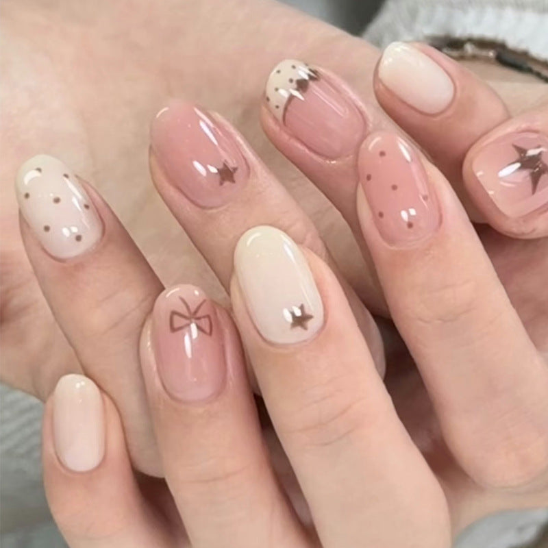 Whimsical Blossom Short Oval Pink and Beige Nail Set with Charming Star and Bow Accents