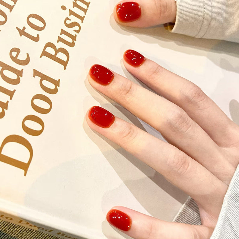 Glamorous Enchantment Short Squoval Shaped Glossy Red Press on Nail Set with a Stunning High Shine Finish