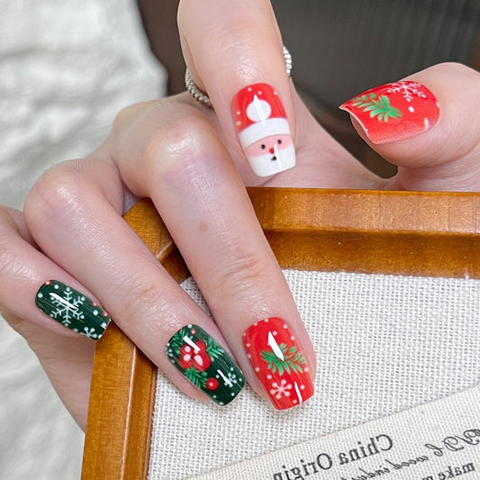 Festive Holiday Spirit Medium Square Red and Green Press-On Nail Set with Charming Santa and Snowflake Designs