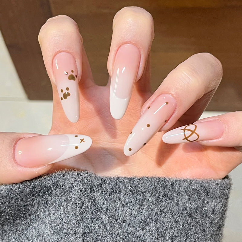 Chic Elegance Long Almond Pink and White Nails with Dazzling Gold Accents