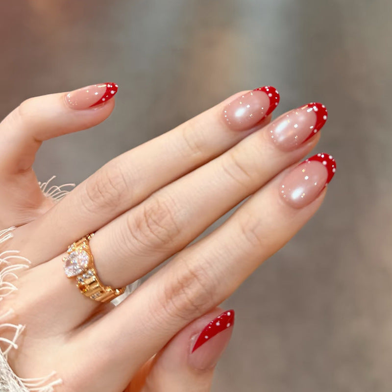 Chic Winter Wonderland Medium Almond Shaped Sheer Pink with Red Tips and Dazzling Dot Accents Press On Nail Set