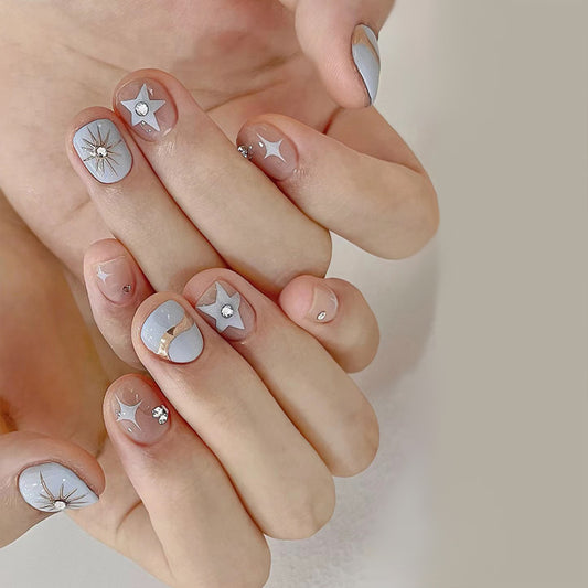 Celestial Charm Short Oval Light Blue Press On Nail Set with Sparkling Star Designs