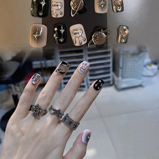 Galaxy Inspired Short Square Shaped Black and Pink Press On Nail Set with Unique Planet and Star Accents
