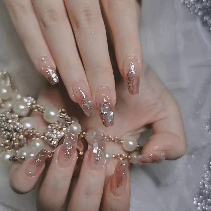 Glamorous Elegance Long Coffin Beige Press On Nail Set with Glitter Accents and Pearlescent Detailing