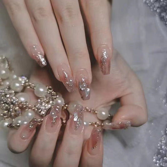Glamorous Elegance Long Coffin Beige Press On Nail Set with Glitter Accents and Pearlescent Detailing