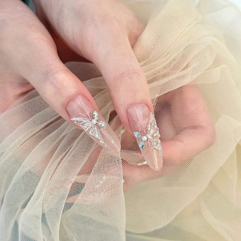 Enchanting Elegance Long Almond Shaped Clear Pink Nails with Intricate Butterfly Design