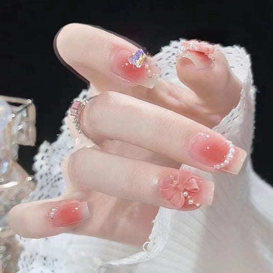 Whimsical Blossom Long Square Peach Ombre Design with Pearl and Bow Embellishments Press On Nail Set
