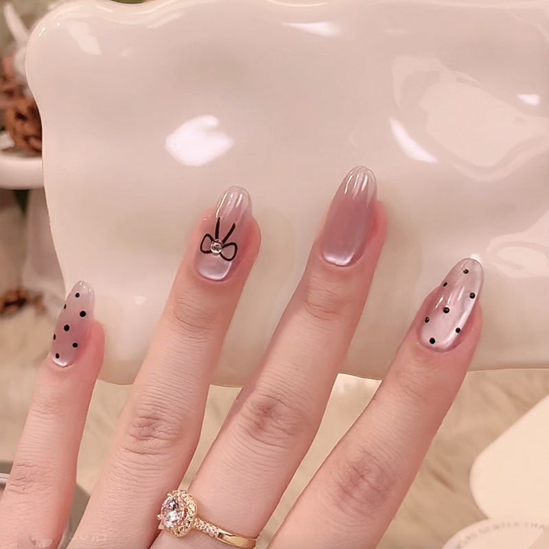 Chic Pastel Elegance Long Almond Clear Gradient Nails with Cute Bow Design and Polka Dots