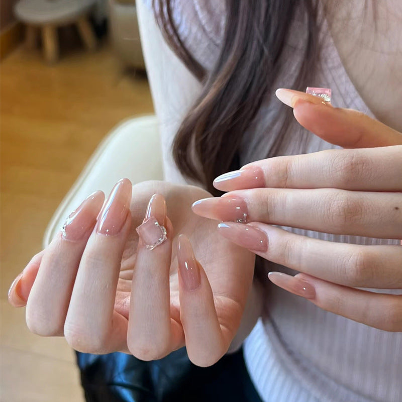 Ethereal Elegance Long Almond Pink Press On Nails with Unique Gem Accents