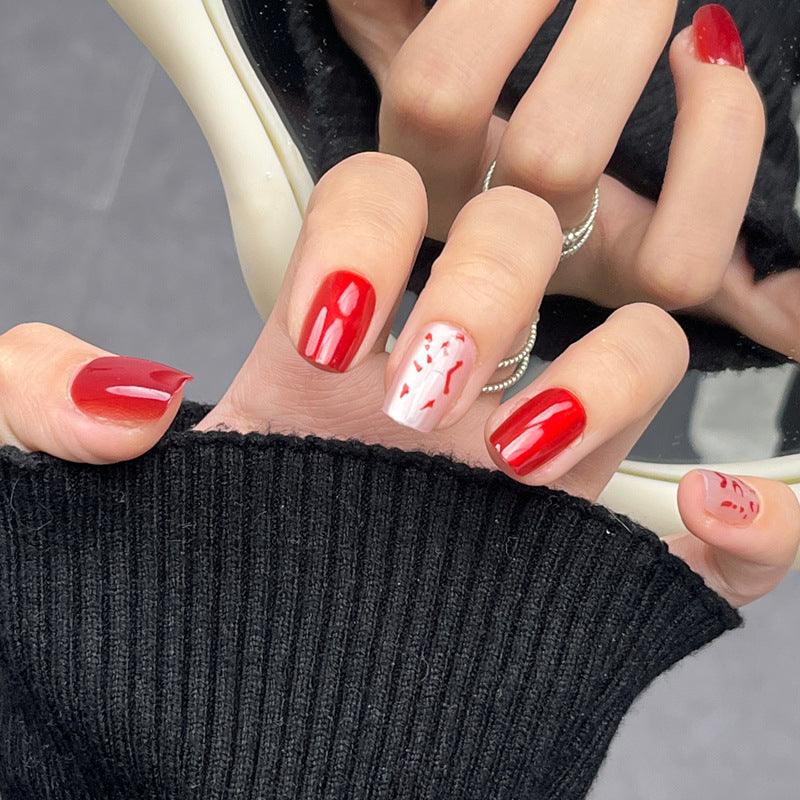 Crimson Celebration Short Square Glossy Red Press On Nail Set with Intricate White Design