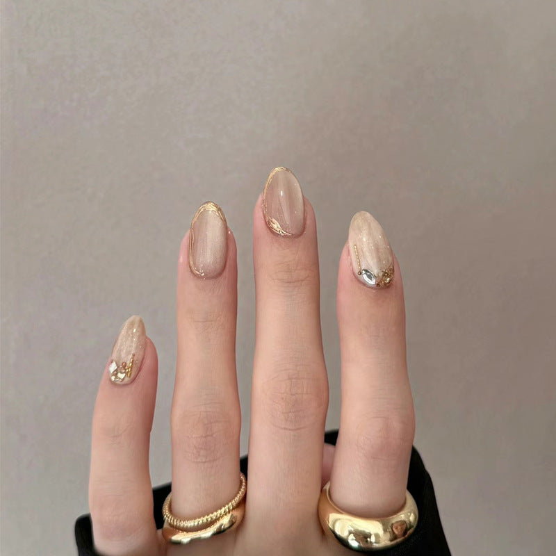 Elegant Glow Medium Oval Beige Nails with Glittering Accent