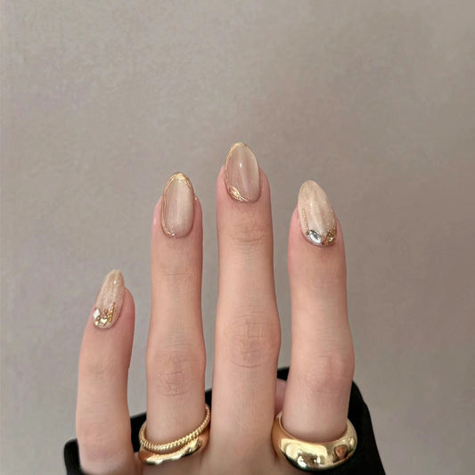 Elegant Glow Medium Oval Beige Nails with Glittering Accent