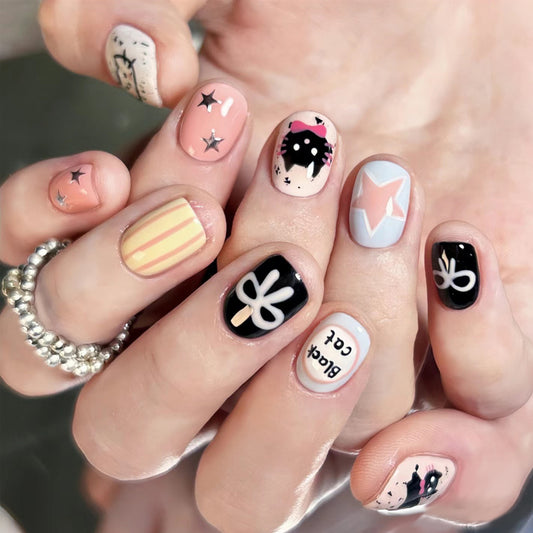 Whimsical Charm Short Round Pastel Multicolored Nail Set with Unique Artistic Designs
