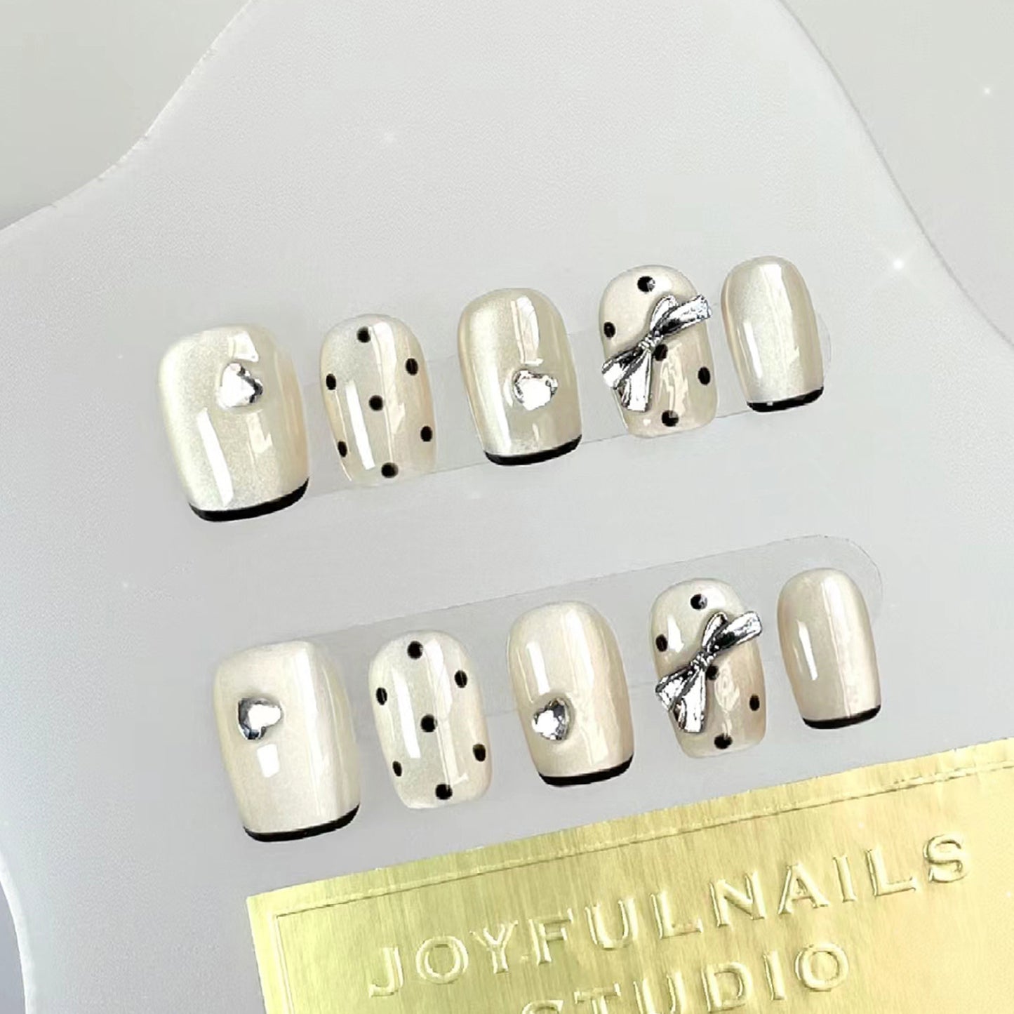 Charming Elegance Short Square Cream Polka Dot Design with Bow and Heart Accents Press On Nail Set