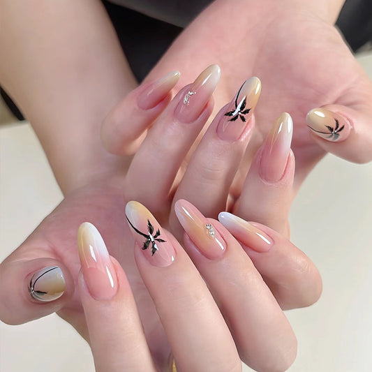 Tropical Paradise Long Almond Shaped Ombre Beige Nails with Elegant Leaf Design