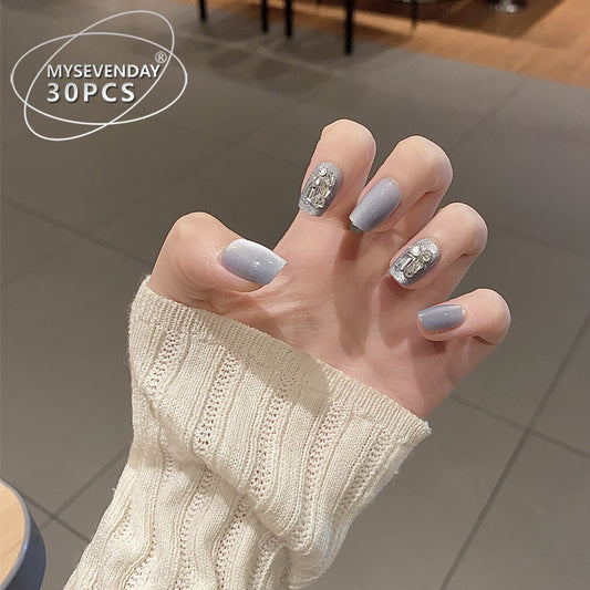 Chic Winter Elegance Medium Square Shimmering Gray Nail Set with Unique Glitter Accent