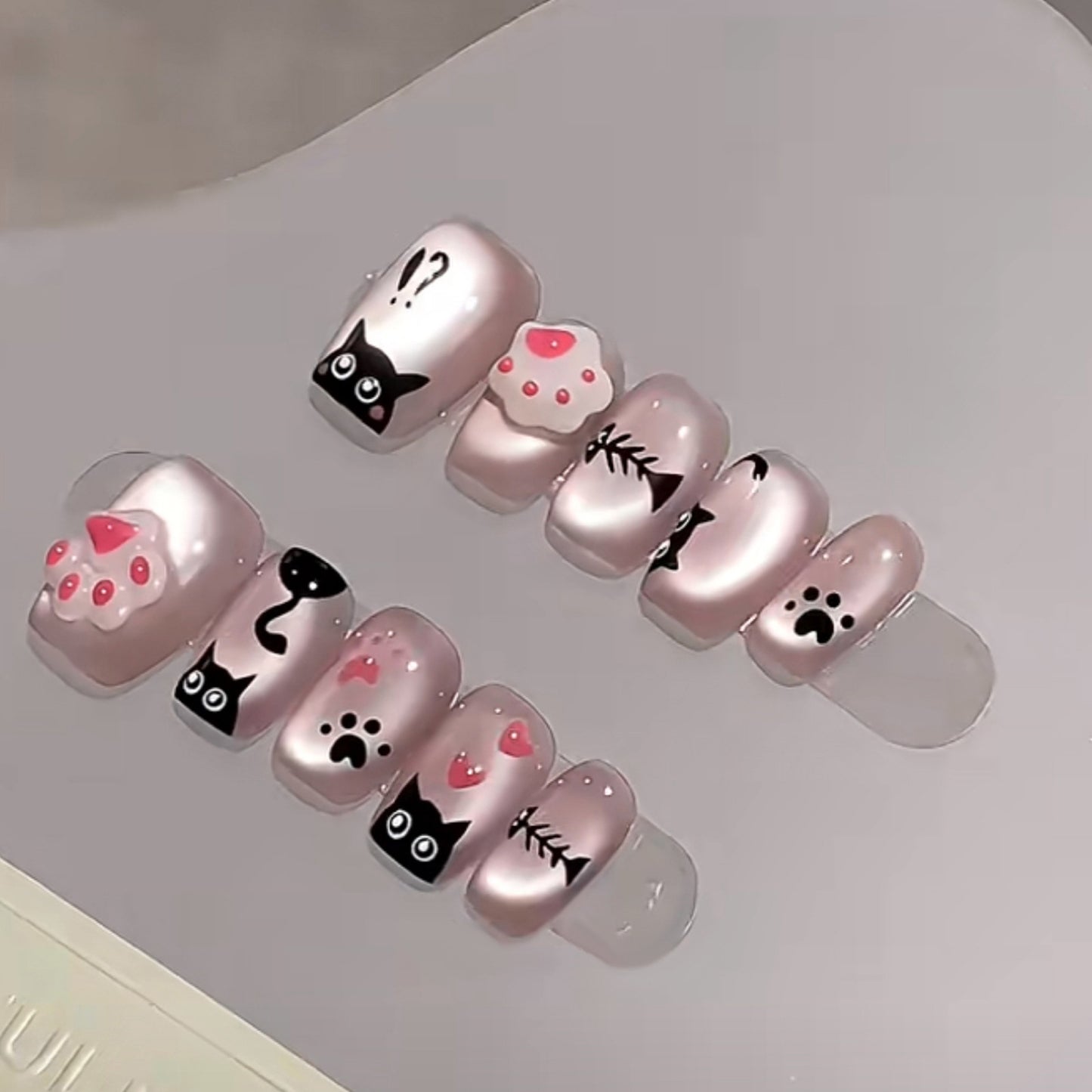 Charming Cat-Themed Press-On Nail Set in Short Length Coffin Shape Glossy Pink Finish with Adorable Cat and Paw Print Designs