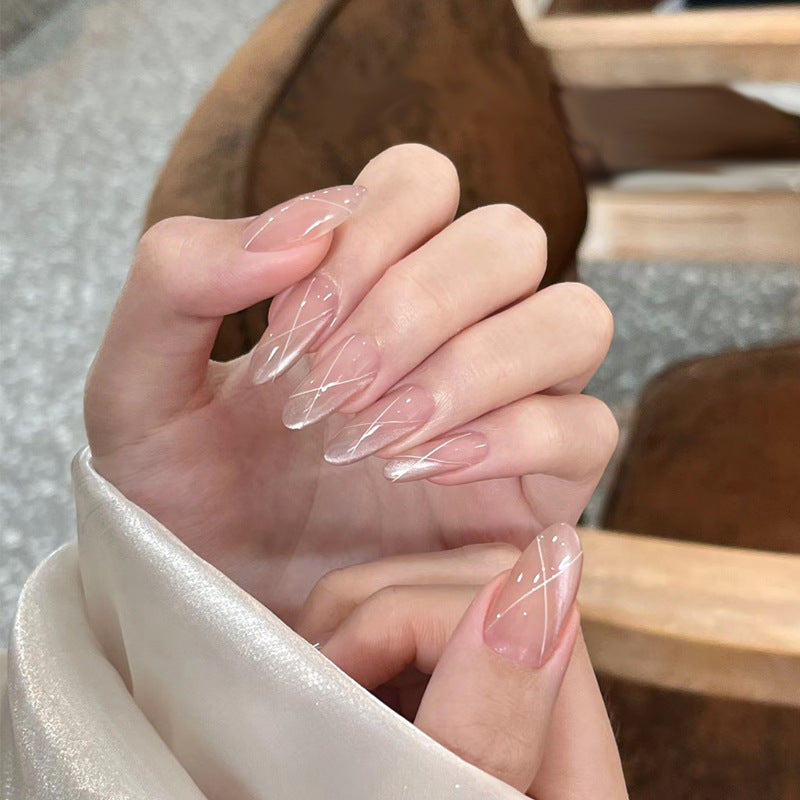 Chic Elegance Medium Almond Light Pink Transparent Nails with Crystal Lattice Design