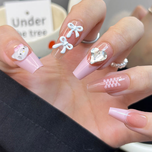 Whimsical Charm Long Coffin Pink Press On Nail Set Featuring Adorable Bow And Gem Embellishments