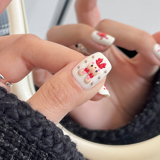 Sweet Holiday Cheer Short Square White Press On Nail Set with Adorable Red Bow and Charming Character Design