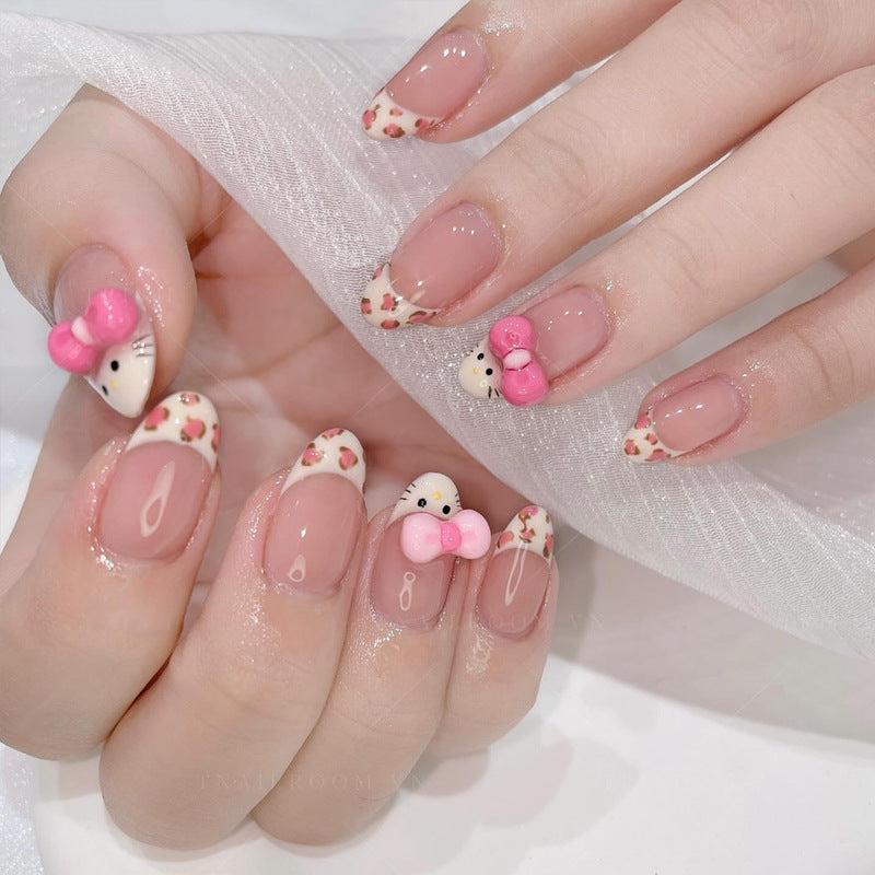 Charming Floral Inspired Press On Nail Set Short Oval Peach with Cute Bow Accents