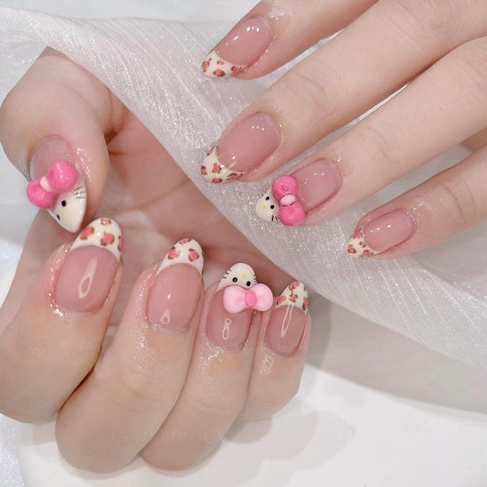 Charming Floral Inspired Press On Nail Set Short Oval Peach with Cute Bow Accents