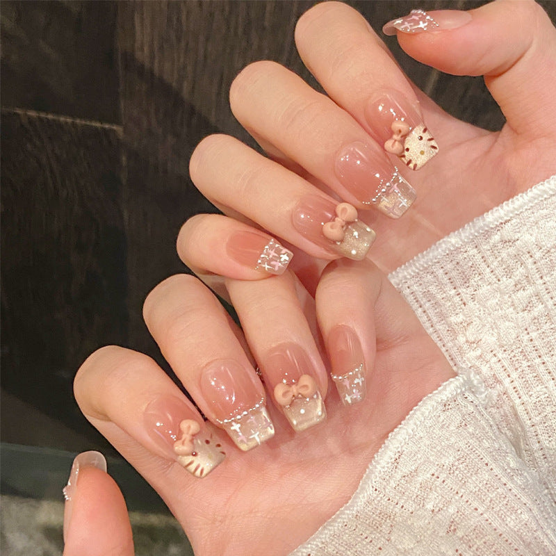 Charming Whimsical Medium Square Press On Nail Set in Soft Pink with Eye-Catching Glitter and Cute Bow Accents