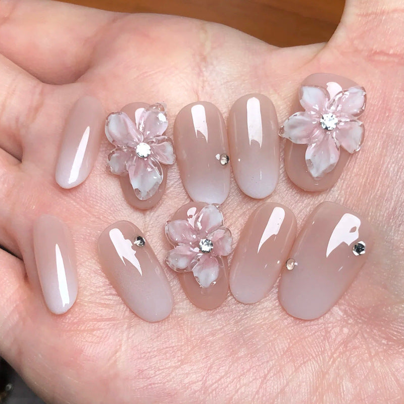 Blossom Elegance Medium Oval Beige Nails with Floral Accents and Gems