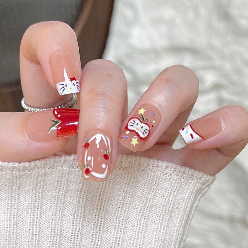 Whimsical Holiday Themed Medium Square Peach Press On Nail Set with Cute Festive Designs