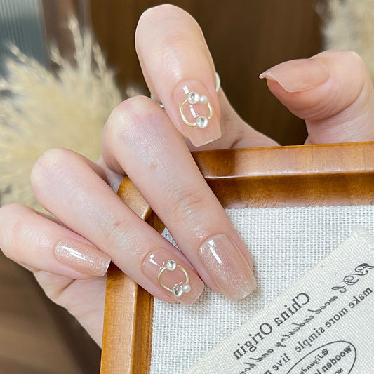 Chic Elegance Medium Square Soft Pink Nail Set with Sparkling Pearl Accent