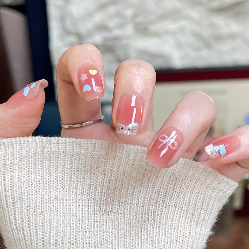 Whimsical Bliss Medium Square Pink Press On Nail Set with Colorful Heart and Star Designs