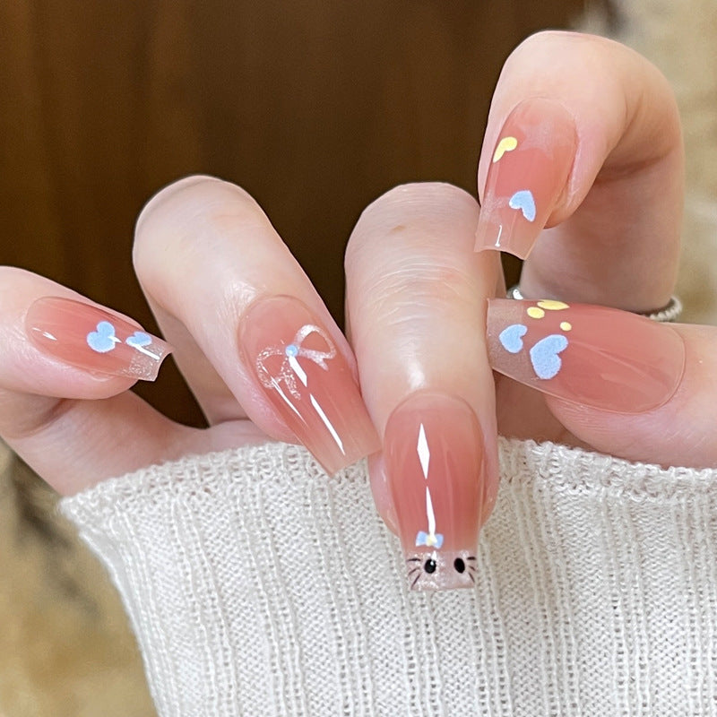Charming Blossom Long Coffin Peach Press On Nail Set Featuring Cute Colorful Designs