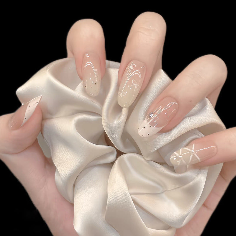 Elegant Glow Medium Almond Beige with Artistic Detailing Press on Nail Set